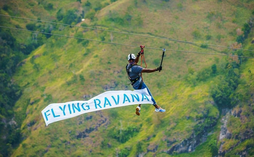 Person soaring on the Flying Ravana Zipline